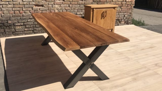 Outdoor dining table with metal legs