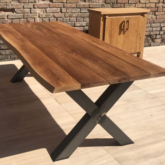 Outdoor dining table with metal legs