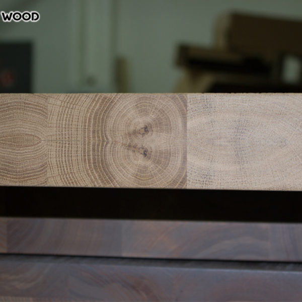 End face of the wooden table-top covered with transparent oil